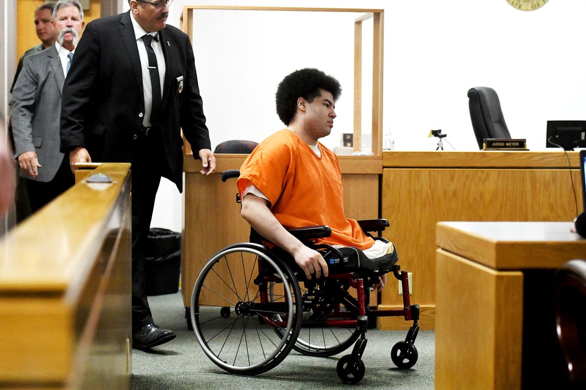 Tyler Rambo enters the courtroom in Coeur d’Alene on Wednesday. Rambo received a 10-year sentence but will be eligible for parole after five years. The sentence stems from an encounter with police during an incident on July 4, 2019. Rambo was carrying a gun that discharged near police which then prompted police to return gun fire that struck him 14 times, resulting in the loss of both of his legs.  (Kathy Plonka/The Spokesman-Review)