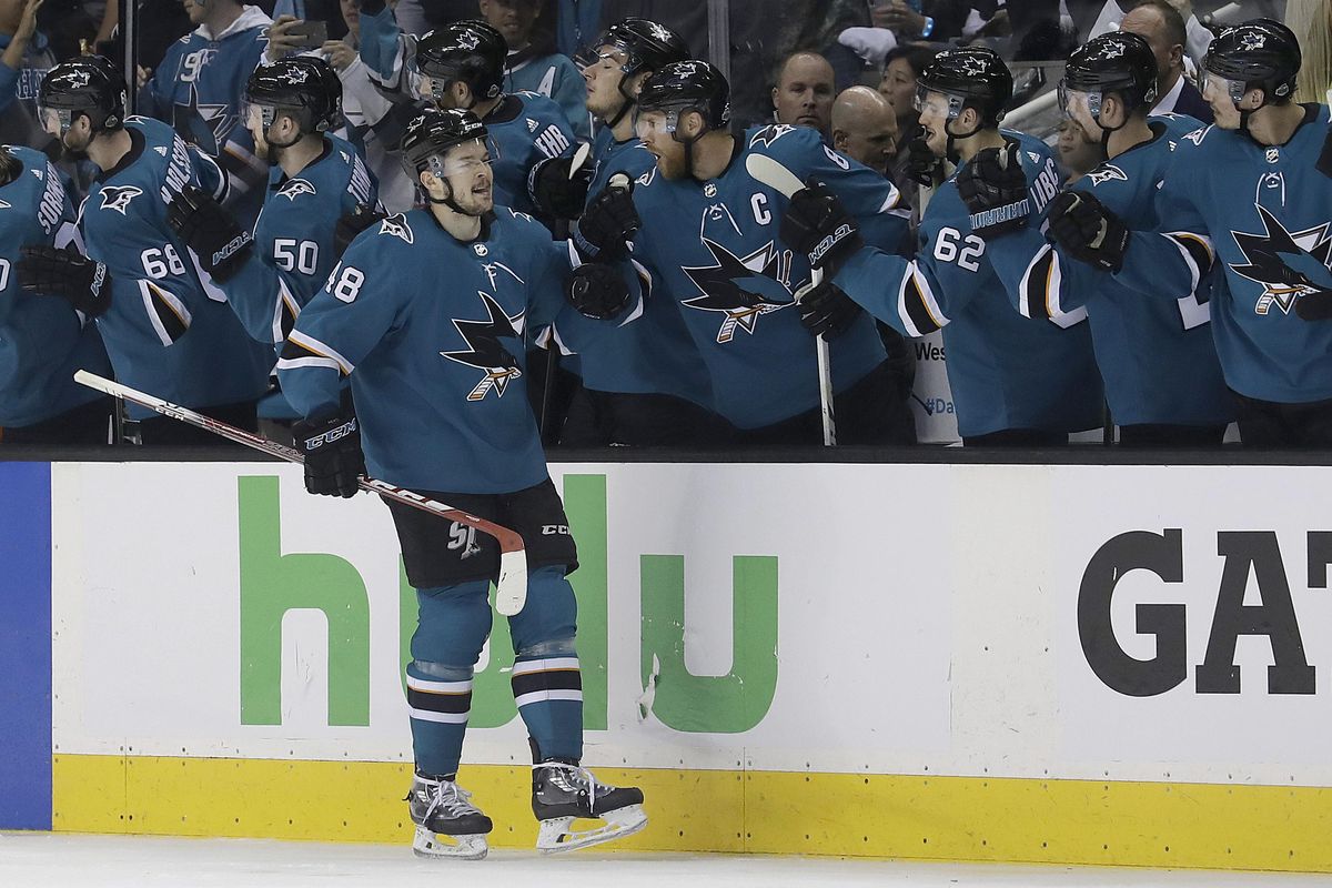 San Jose Sharks center Tomas Hertl, foreground, from the Czech Republic, is congratulated by teammates after scoring a goal against the Vegas Golden Knights during the second period of Game 4 of an NHL hockey second-round playoff series in San Jose, Calif., Wednesday, May 2, 2018. (Jeff Chiu / Associated Press)