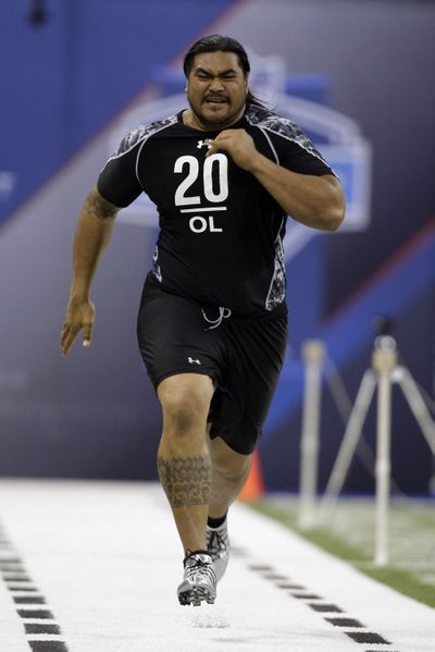 Former Idaho offensive lineman Mike Iupati runs the 40-yard dash at the NFL football scouting combine in Indianapolis, Saturday, Feb. 27, 2010. (Michael Conroy / Associated Press)