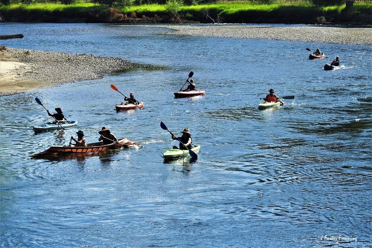 Boyd and Bobbie Mollenburg paddle a Salishan Sturgeon Nose Canoe ahead of a pack of others on the Kettle River on July 18, 2020.  (J. Foster Fanning/courtesy)