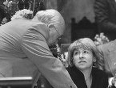 
Sen. Lisa Brown, D-Spokane, talks with Sen. Jim Clements, R-Selah, before a vote on school district funding. 
 (RICHARD ROESLER / The Spokesman-Review)