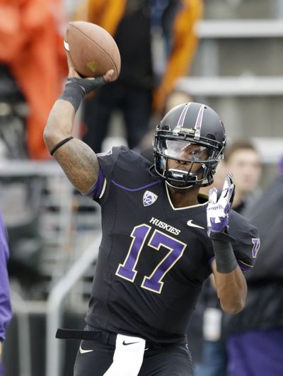 Huskies QB Keith Price will end his college career Friday. (Associated Press)