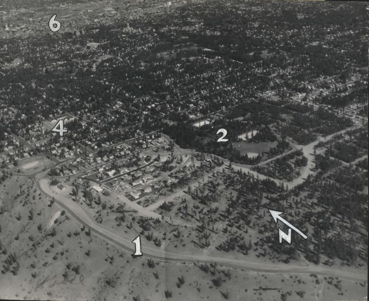 High drive is the most prominent landmark in this 1955 aerial photo of southwest Spokane. The landmarks include High drive (1), Comstock Park (2). (Cowles Publishing)