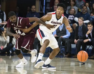 Gonzaga forward Rui Hachimura and Texas Southern forward Lamont Walker chase a loose ball last Friday. (Colin Mulvany / The Spokesman-Review)