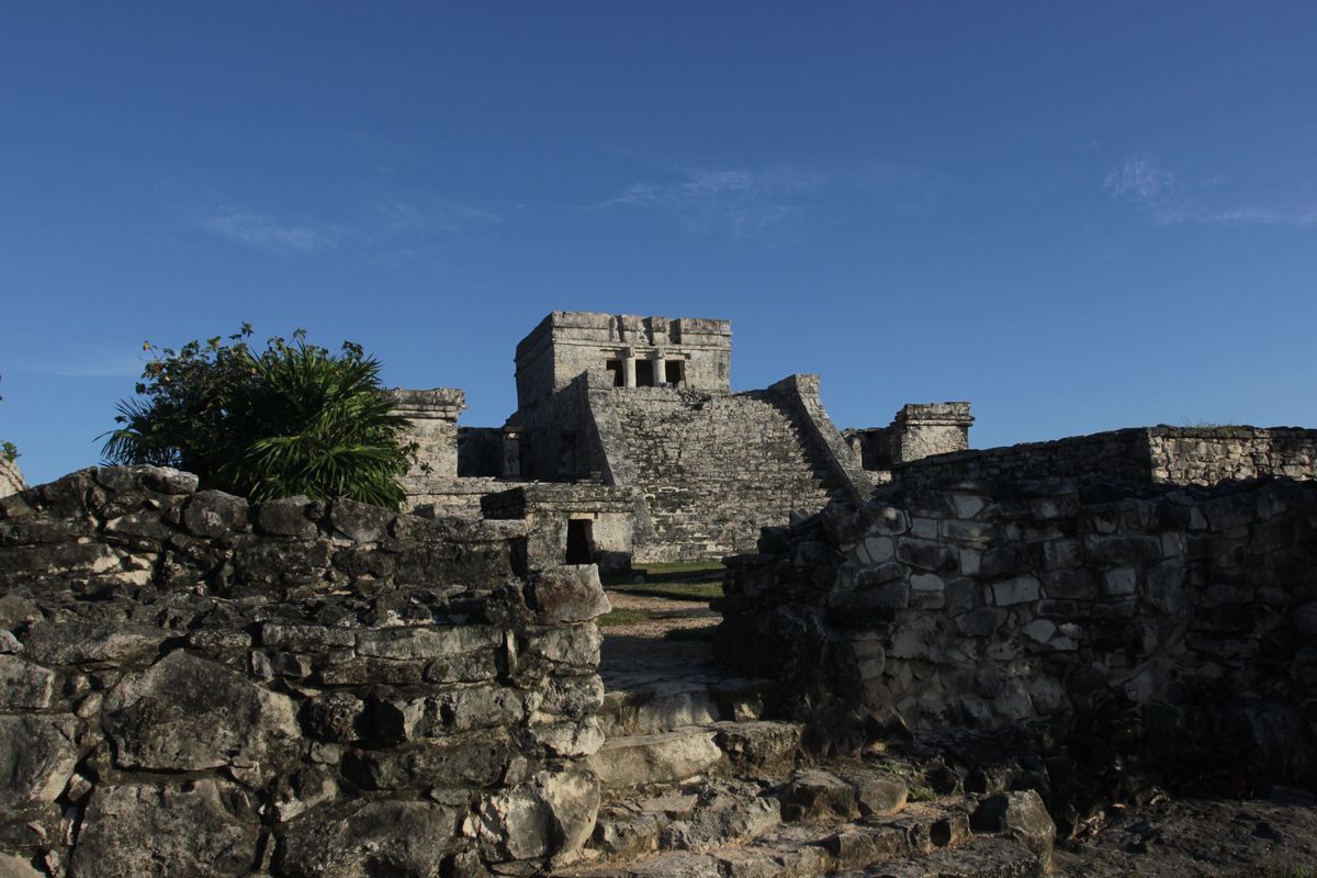 In this January photograph, the Castle of the Mayan ruins in Tulum, Mexico, is lit by late afternoon sun. The complex of crumbling structures here is smaller and less impressive than some other Mayan sites like Chichen Itza, but its location atop seaside cliffs is one of the most scenic ruin sites on the Yucatan. (Associated Press)