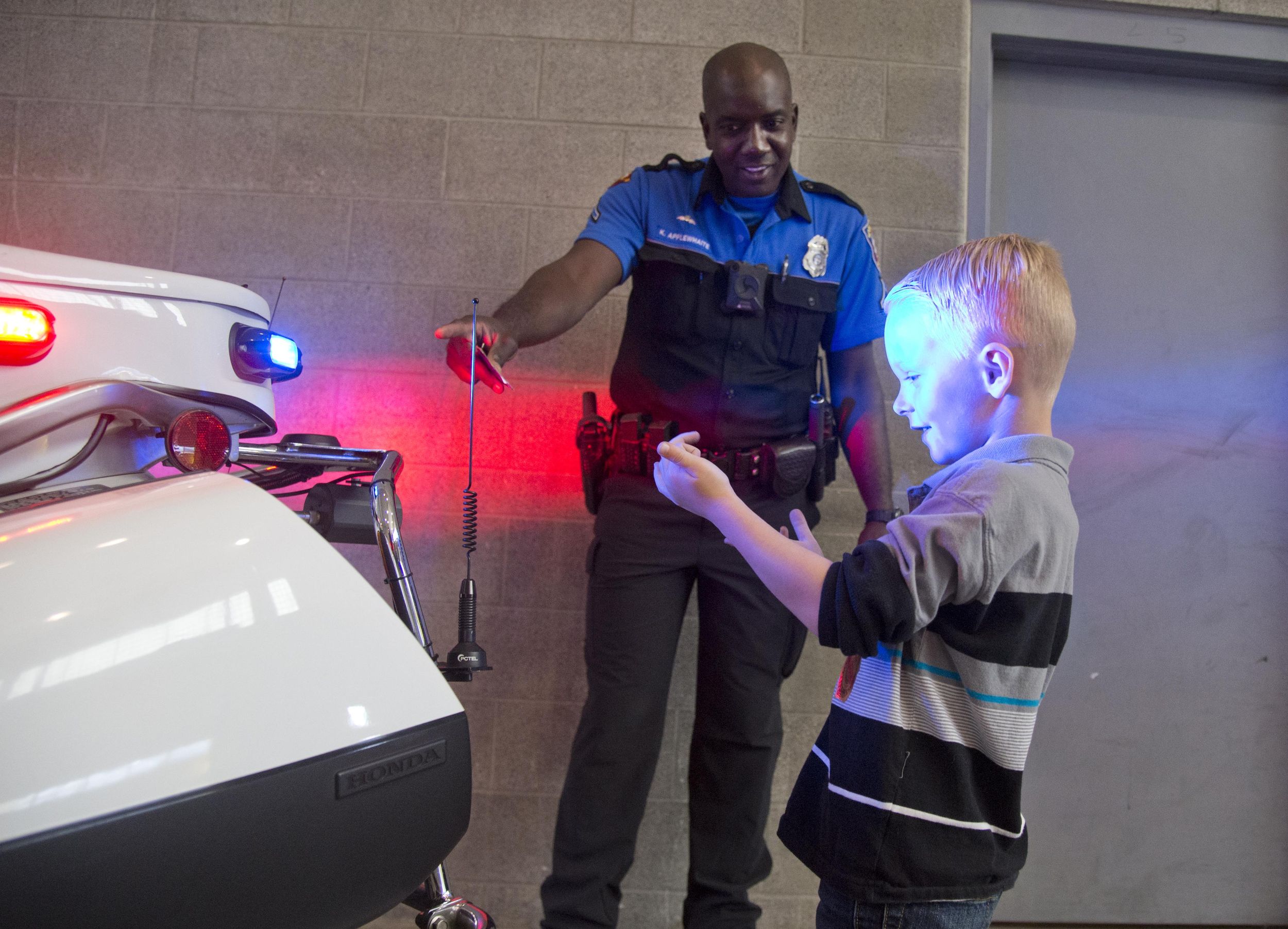 Spokane police firefighters helping kids with autism get