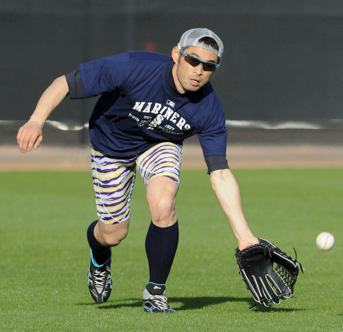 Ichiro Suzuki stepped out in style to get in some fielding around taking his physical Monday.  (Associated Press)