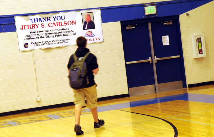 This banner was hanging in the gym at Coeur d'Alene High School on Tuesday, February 24, 2009. Jerry Carlson, a prominent Coeur d'Alene insurance agent and school booster has been charged with possessing five grams of cocaine last week is part of a larger criminal conspiracy investigation involving at least a half a kilo of the drug. In addition to a state charge of possession of a controlled substance, Jerry S. Carlson faces three federal charges related to distribution of more than 500 grams of cocaine that took place over several months. KATHY PLONKA The Spokesman-Review (Kathy Plonka / The Spokesman-Review)