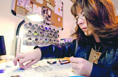 
Jewelry maker Pam Wilde works in her home office in Dalton Gardens.  She and fiance Patrick Cancilla converted a bedroom into the work space. 
 (Photos by Jesse Tinsley/ / The Spokesman-Review)