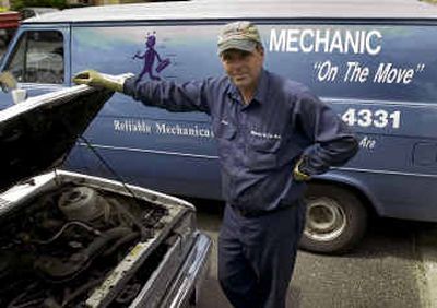 
 Mobile car mechanic Steve Simmons has been the guy behind Mechanic on the Move for 17 years in Spokane. 
 (Colin Mulvany / The Spokesman-Review)