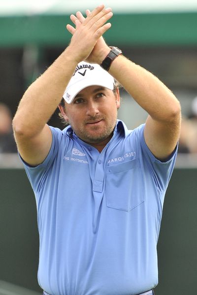 Graeme McDowell hit two clutch putts to edge Tiger Woods. (Associated Press)