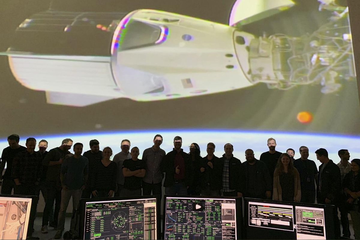 The SpaceX team in Hawthorne, Calif., watches as the SpaceX Crew Dragon docks with the International Space Station’s Harmony module on Sunday, March 3, 2019. SpaceX’s new crew capsule arrived at the International Space Station on Sunday, acing its second milestone in just over a day. (Associated Press)