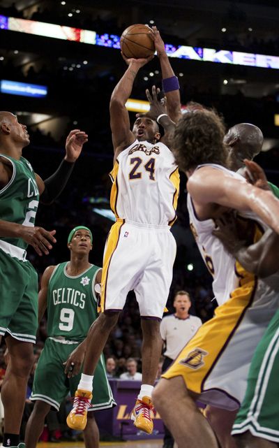 Lakers’ Kobe Bryant shoots against the Boston Celtics during the second half of Thursday’s game in Los Angeles. (Associated Press / The Spokesman-Review)