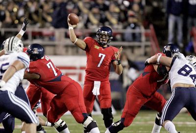 Arizona’s Willie Tuitama threw for 322 yards and two touchdowns.  (Associated Press / The Spokesman-Review)