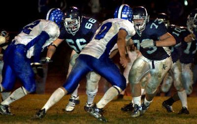 
Lake City offensive linemen Nolan Hout,  left facing, and Mike Vickhammer  have the attention of college recruiters.
 (Tom Davenport/ / The Spokesman-Review)