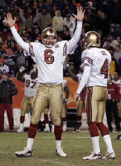 
San Francisco 49ers kicker Joe Nedney (6) celebrates knocking Denver from the playoffs.
 (Associated Press / The Spokesman-Review)
