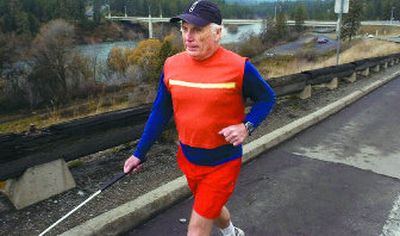 
Bryant McKinley jogs up Doomsday Hill as he prepares for another Bloomsday. He has run for the past 20 years with a guide to help with his blindness. 
 (CHRISTOPHER ANDERSON / The Spokesman-Review)