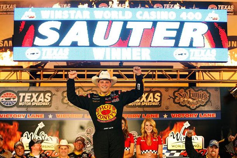 Johnny Sauter kicks off the Victory Lane celebration after winning the NASCAR Camping World Truck Series' WinStar World Casino 400 at Texas Motor Speedway on June 8, 2012. (Chris Graythen / Getty Images North America)