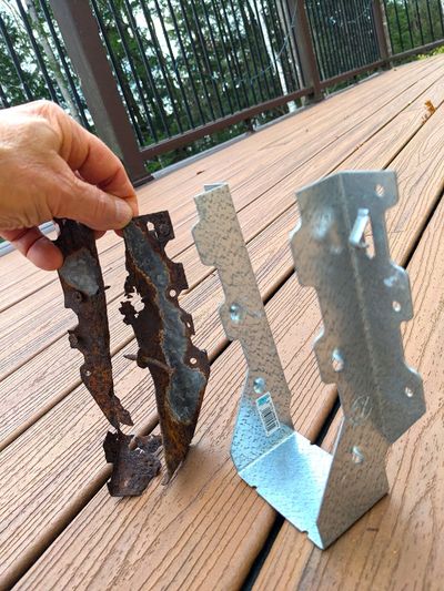 The joist hanger on the left was from a home 13 miles from Chesapeake Bay in Baltimore. The new joist hanger on the right shows you what yours should look like with no rust.  (Tribune Content Agency)