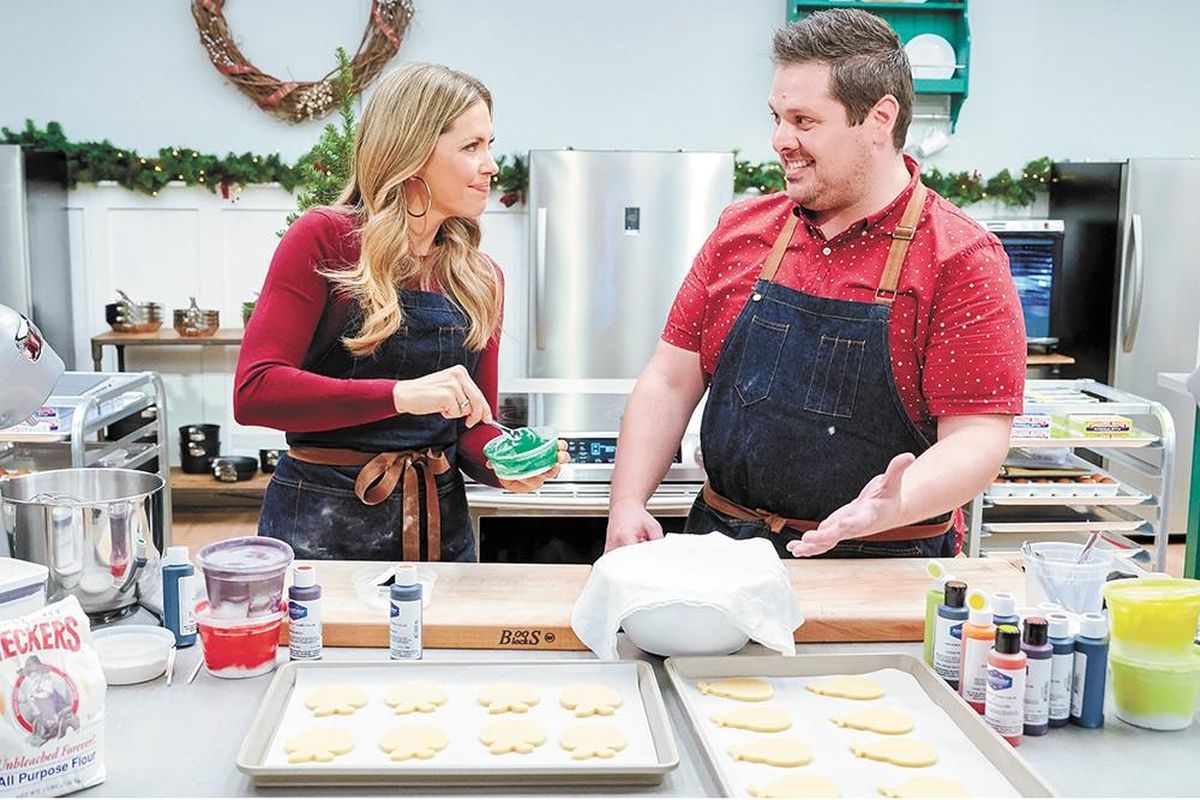 Actress Pascale Hutton and Spokane chef Ricky Webster are paired on the Hallmark Channel’s “Christmas Cookie Matchup.” (Kim Nunneley / Alexx Henry Studios)