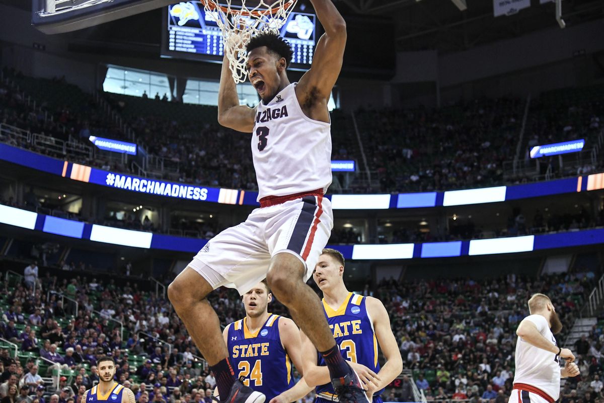 Gonzaga forward Johnathan Williams roars with delight after slam dunking on South Dakota State during the second half of a first round NCAA mens college basketball tournament game, Thurs., March 16, 2017, at the VivInt Smart Home Arena in Salt Lake City. (Dan Pelle / The Spokesman-Review)