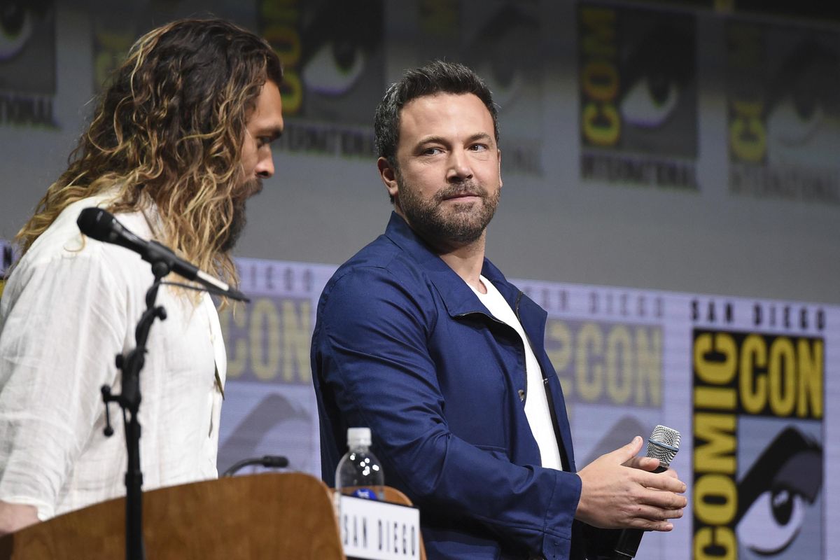 Richard Shotwell/Invision/




Jason Momoa, left, and Ben Affleck attend the Warner Bros. "Justice League" panel on day three of Comic-Con International on Saturday in San Diego. (Richard Shotwell / AP)