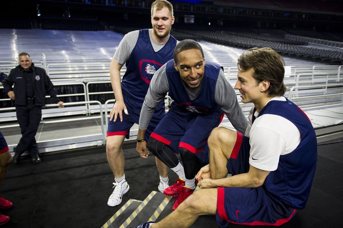 From left, Bulldogs’ Przemek Karnowski, Eric McClellan and Kevin Pangos get ready to take the court for practice on Thursday. (Colin Mulvany)
