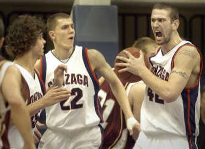 
The Spokesman-Review Josh Heytvelt, right, was a warrior on offense (15 points) and defense in Gonzaga's 52-48 victory over Santa Clara.
 (Christopher Anderson / The Spokesman-Review)