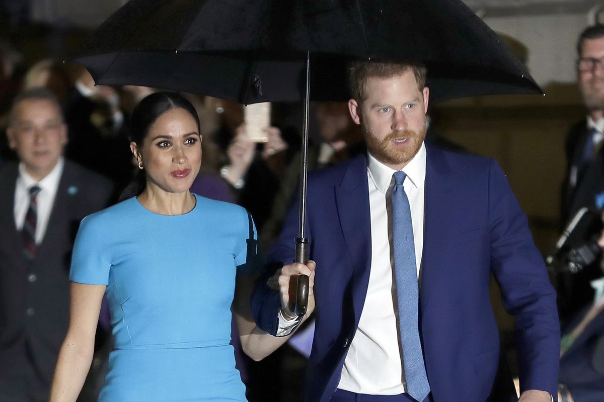 FILE - Prince Harry and Meghan, the Duke and Duchess of Sussex arrive at the annual Endeavour Fund Awards in London on March 5, 2020. The Duchess of Sussex has revealed that she had a miscarriage in July. Meghan described the experience in an opinion piece in the New York Times on Wednesday. She wrote: "I knew, as I clutched my firstborn child, that I was losing my second." The former Meghan Markle and husband Prince Harry have a son, Archie, born in 2019.  (Kirsty Wigglesworth)
