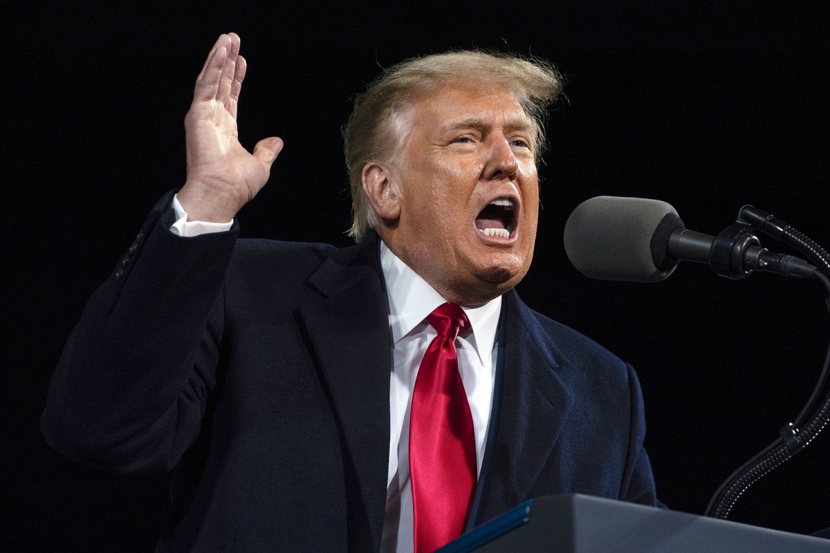 In this Dec. 5, 2020 photo, President Donald Trump speaks at a campaign rally for Senate Republican candidates in Valdosta, Ga. A report by the Senate Judiciary Committee