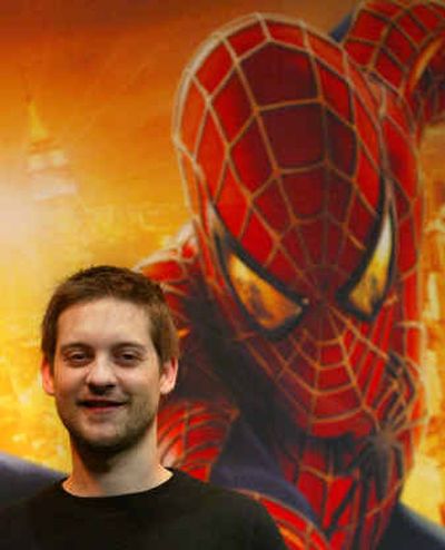 Tobey Maguire smiles at a press conference for