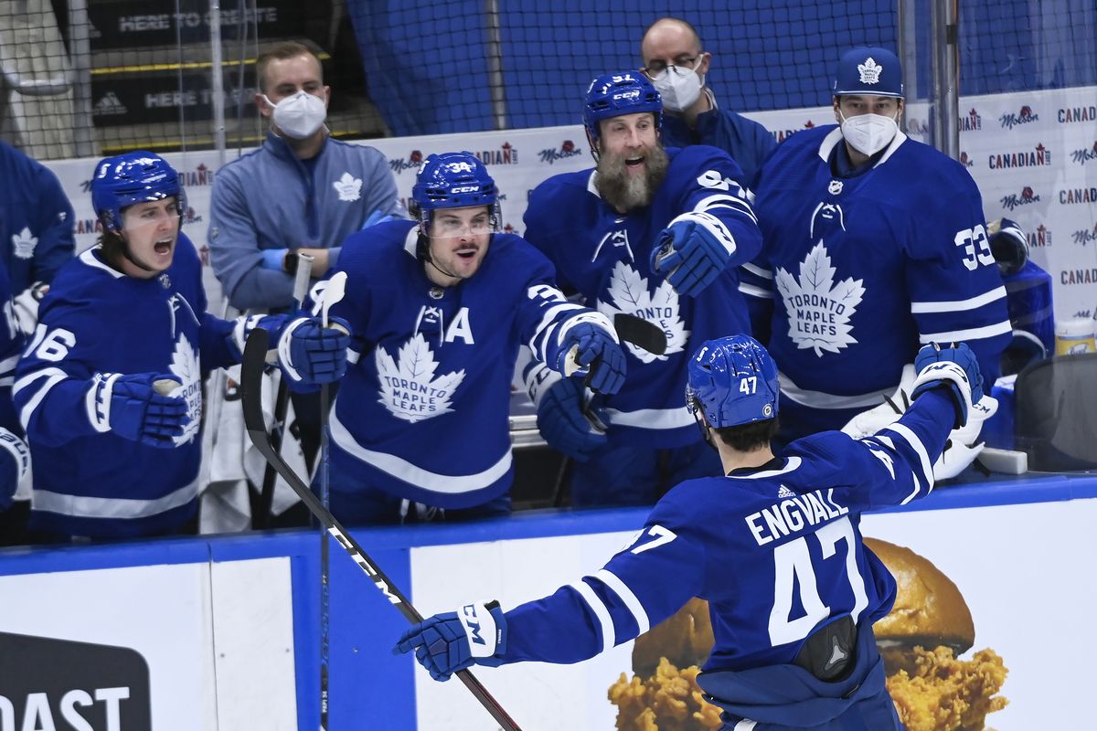 Toronto Maple Leafs forward Pierre Engvall celebrates his goal against the Montreal Canadiens with teammates Mitchell Marner, left, Auston Matthews, Joe Thornton and David Rittich during the second period of an NHL game May 8 in Toronto.  (Nathan Denette)