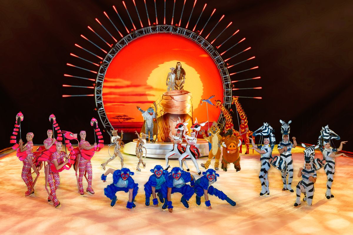 Disney on Ice skaters perform “The Circle of Life” from “The Lion King.” Ensemble performer Jaden Schwab, of Saint Paul, Minn., plays a giraffe in this number.  (Courtesy of Geo Rittenmyer)