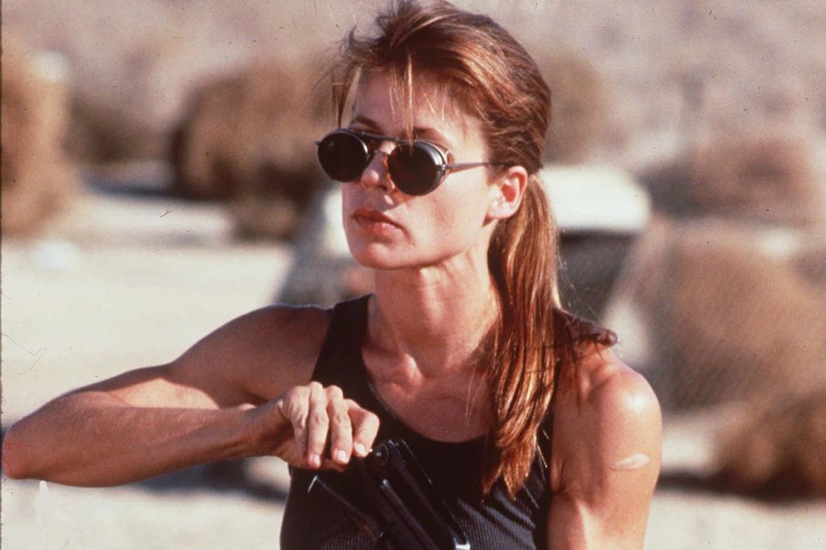 Actress Linda Hamilton appears in this 1991 photo in a scene from the movie "Terminator 2." Hamilton buffed up for the role, and held her own opposite Arnold Schwarzenegger. (ZADE ROSENTHAL / Associated Press)