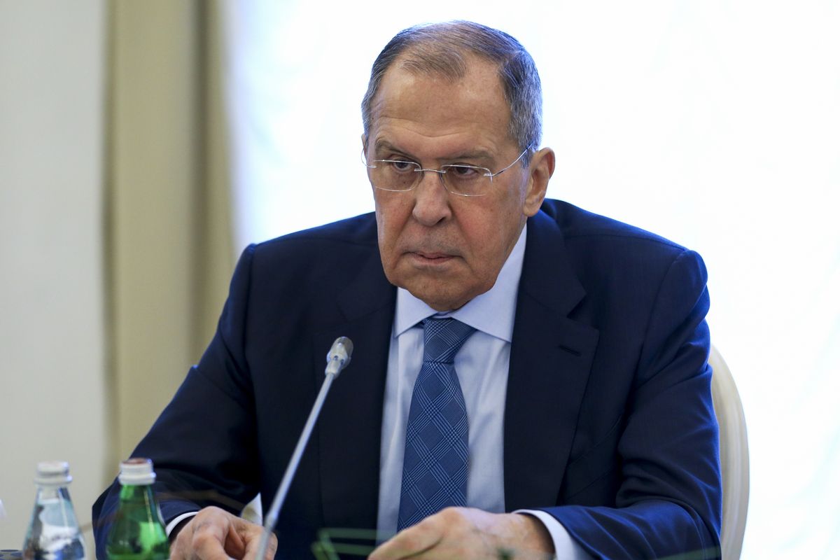 In this handout photo released by Russian Foreign Ministry Press Service, Russian Foreign Minister Sergey Lavrov speaks during his talks with Finnish Foreign Minister Pekka Haavisto in St. Petersburg, Russia, Monday, Feb. 15, 2021. Lavrov blamed the European Union for a freeze in ties and argued that Moscow remains ready to mend relations.  (HOGP)