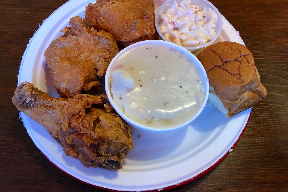 Fried chicken with macaroni salad, mashed potatoes and gravy and a roll are for lunch at Chicken N More in downtown Spokane.  (Don Chareunsy/The Spokesman-Review)