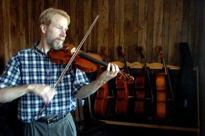 
Arvid Lundin, a fiddler and part of a longtime fiddling family, has recently opened a new Lundin's Violins in Coeur d'Alene at 3202 N. Fourth St. The shop will sell, rent and repair stringed instruments including violas, cellos and basses. 
 (Jesse Tinsley / The Spokesman-Review)