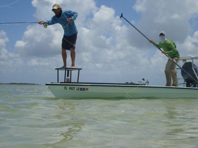 A fly fisher casts for permit in the Bahamas for the movie 