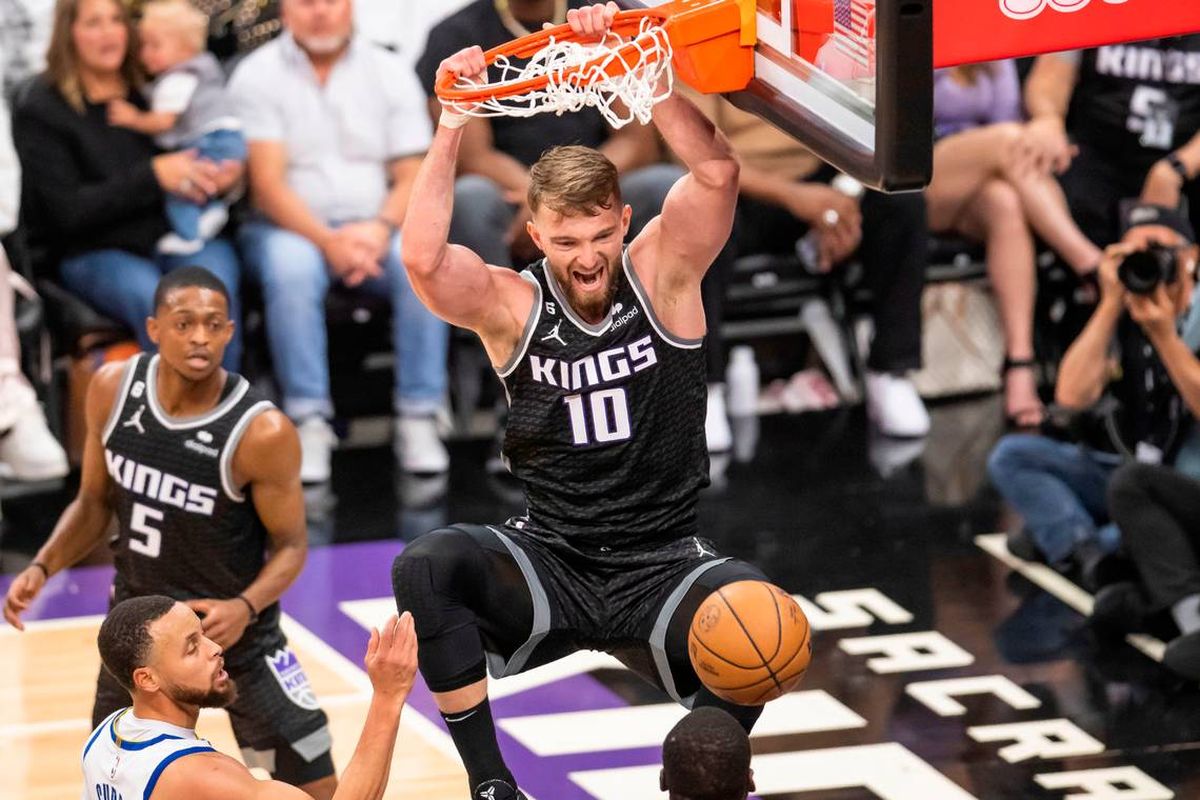 Sacramento Kings center Domantas Sabonis dunks during Game 1 of the NBA playoffs against the Golden State Warriors. Sabonis recently converted to Judaism.  (Tribune News Service)