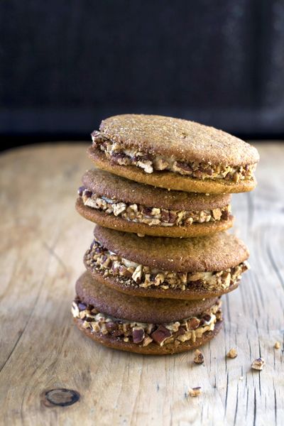 Pecan Pumpkin Gingerbread Whoopie Pies combine traditional fall flavors and have a praline cream cheese filling and edges that have been rolled in toasted chopped pecans. (Associated Press)