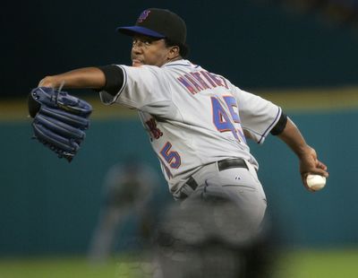 Pedro Martinez’s next stint may be with the Cubs or Rays.  (File Associated Press / The Spokesman-Review)
