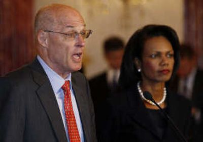 
Treasury Secretary Henry Paulson, accompanied by Secretary of State Condoleezza Rice, announces new sanctions against Iran on Thursday at the State Department in Washington. Associated Press
 (Associated Press / The Spokesman-Review)