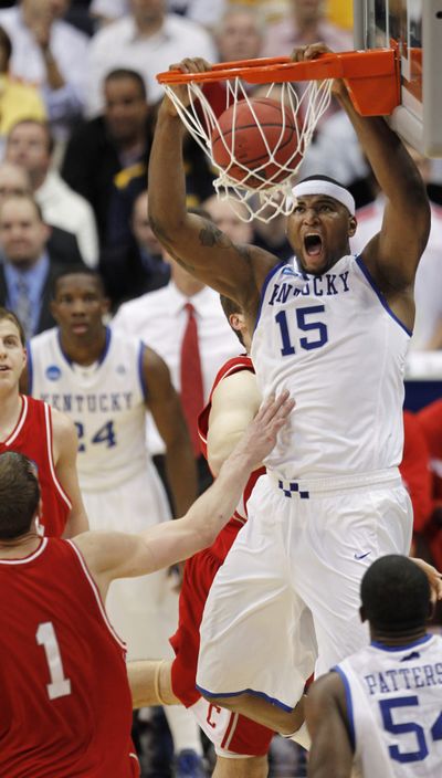 Associated Press Kentucky’s DeMarcus Cousins throws one down. (Associated Press / Associated Press)