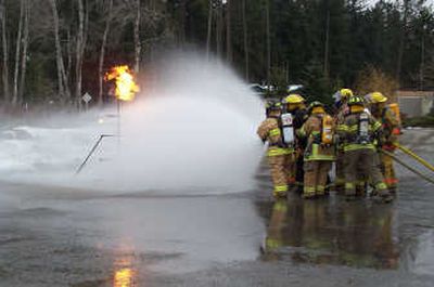 
Newman Lake Fire and Rescue personnel practice fighting propane fires at Hauser Lake with Kootenai County and Hauser Lake Fire Protection District firefighters. Photo courtesy of Hauser Lake Fire Protection District
 (Photo courtesy of Hauser Lake Fire Protection District / The Spokesman-Review)