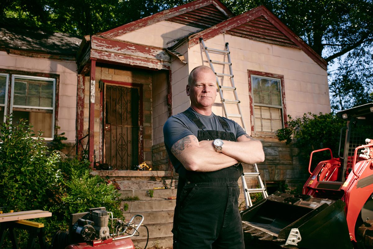 This photo provided by FOX shows professional contractor Mike Holmes, who has a new show called “Home Free,” airing Wednesdays on FOX. It’s a competition series where nine couples are challenged each week to restore a run-down home in Atlanta. (Associated Press)