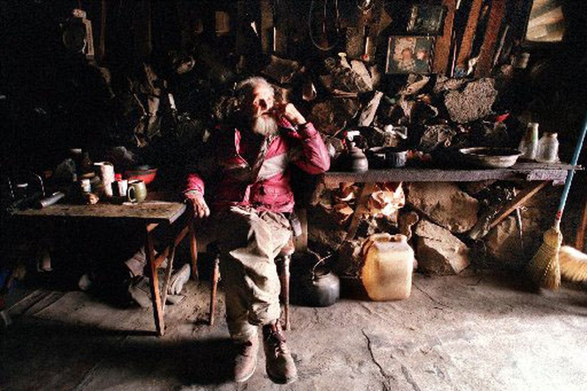 Richard Zimmerman, otherwise known as Dugout Dick, sits in one of several caves he built in the hills of central Idaho in this undated photo. The Idaho legend died Wednesday at age 94.  (FILE PHOTOS Associated Press)
