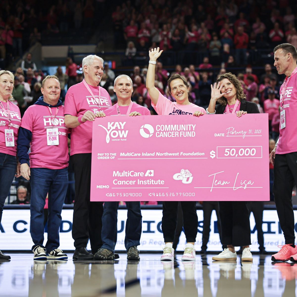 The Community Cancer Fund presented Gonzaga coach Lisa Fortier a $50,000 check in her honor written to the Multicare Inland Northwest Foundation. (Courtesy of Gonzaga Athletics)
