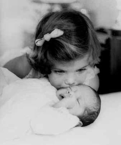
 Richard Avedon photo shows Caroline Kennedy, 3, kissing her brother John F. Kennedy Jr. in 1961 in Palm Beach, Fla. 
 (File/Associated Press / The Spokesman-Review)