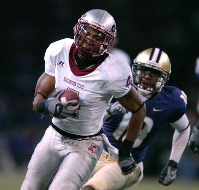 WSU receiver Brandon Gibson turns upfield for a long gain during second half action at the 100th Apple Cup played Saturday November 24, 2007 at Husky Stadium in Seattle.  CHRISTOPHER ANDERSON The Spokesman-Review (Christopher Anderson / The Spokesman-Review)