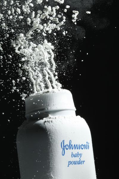 In this 2010 file photo, Johnson’s baby powder is squeezed from its container in Philadelphia. (Matt Rourke / Associated Press)